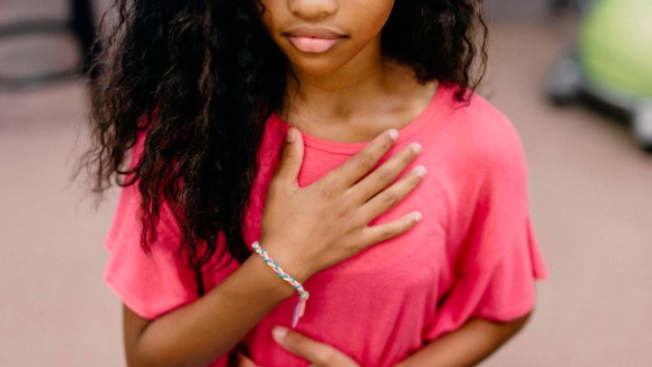 a close up of a girl