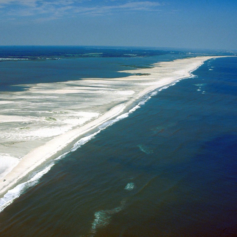 a body of water next to the ocean