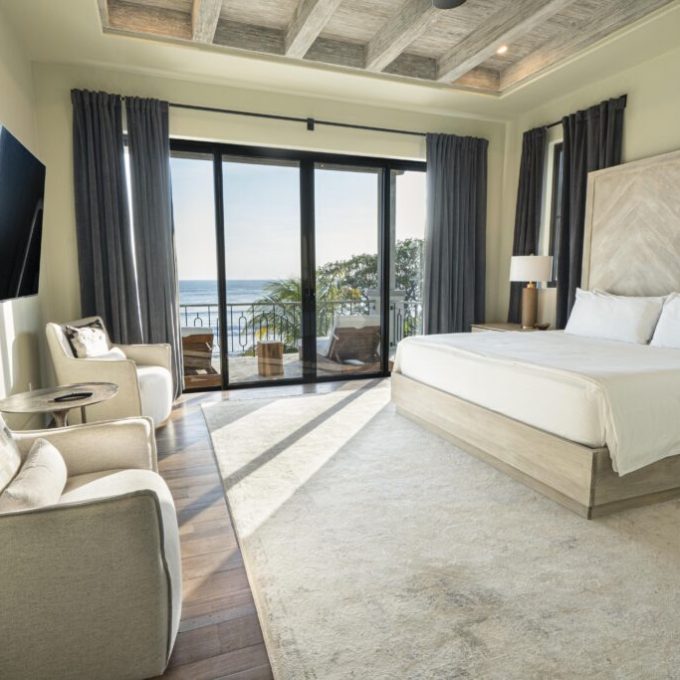 a bedroom with a large bed in a room