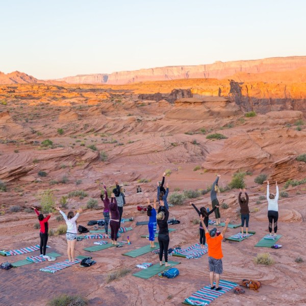 a group of people in a canyon