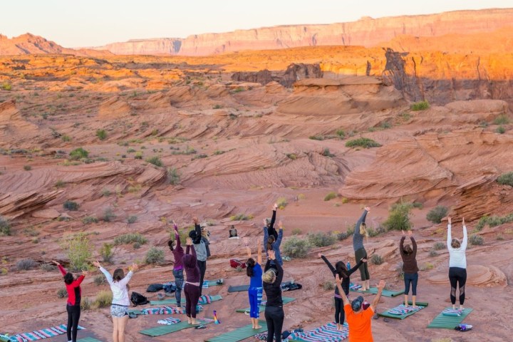 a group of people in a canyon