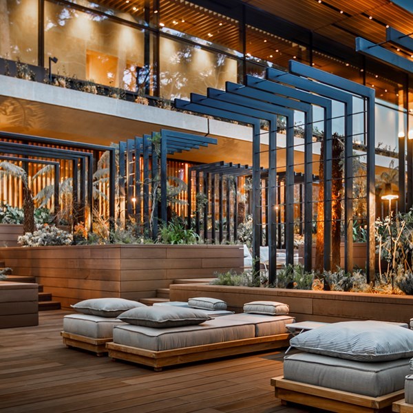 a living area with a building in the background