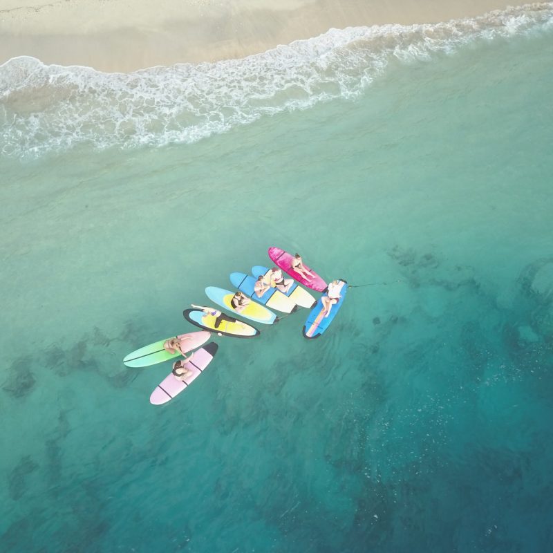 a person riding a wave on a surfboard in the water
