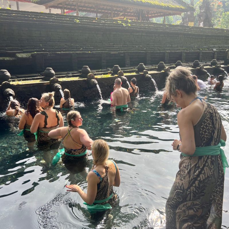 a group of people in the water