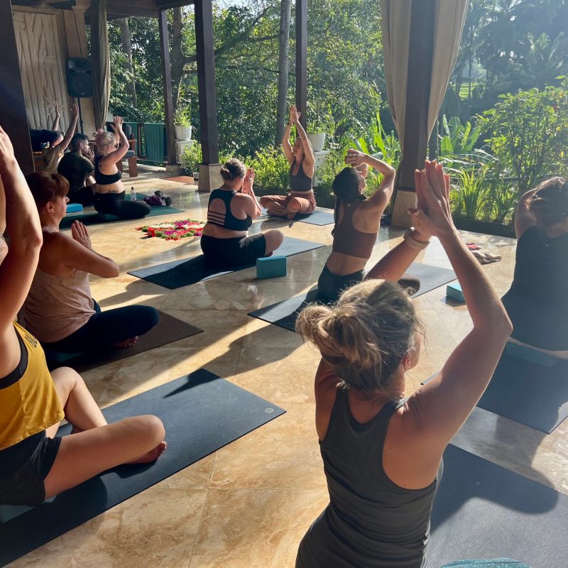 a group of people sitting on the ground