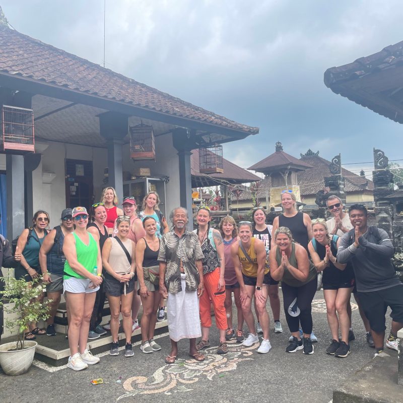 a group of people standing in front of a building
