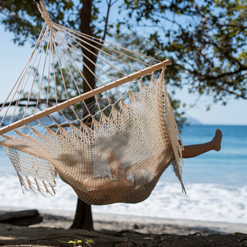 a close up of a boat next to a body of water
