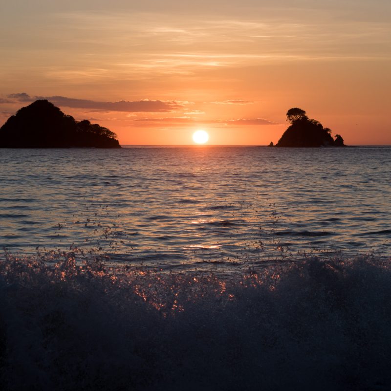 a sunset over a body of water