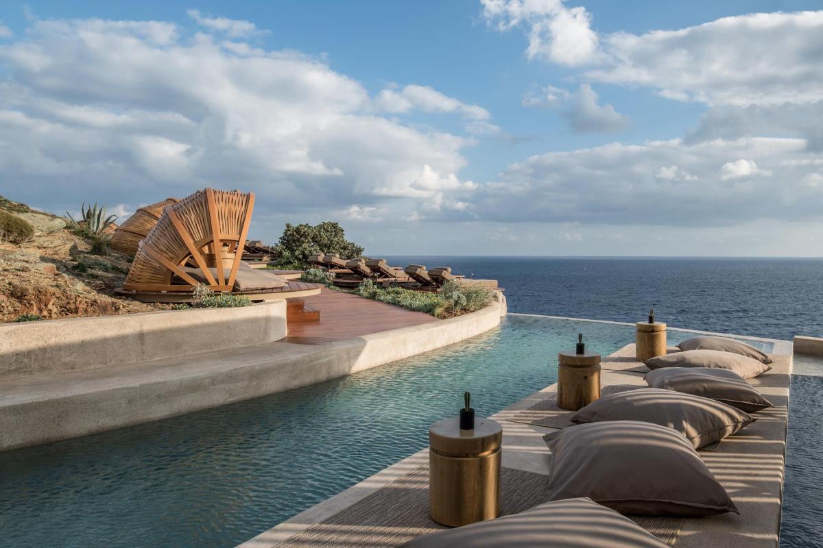 a stone bridge over a body of water