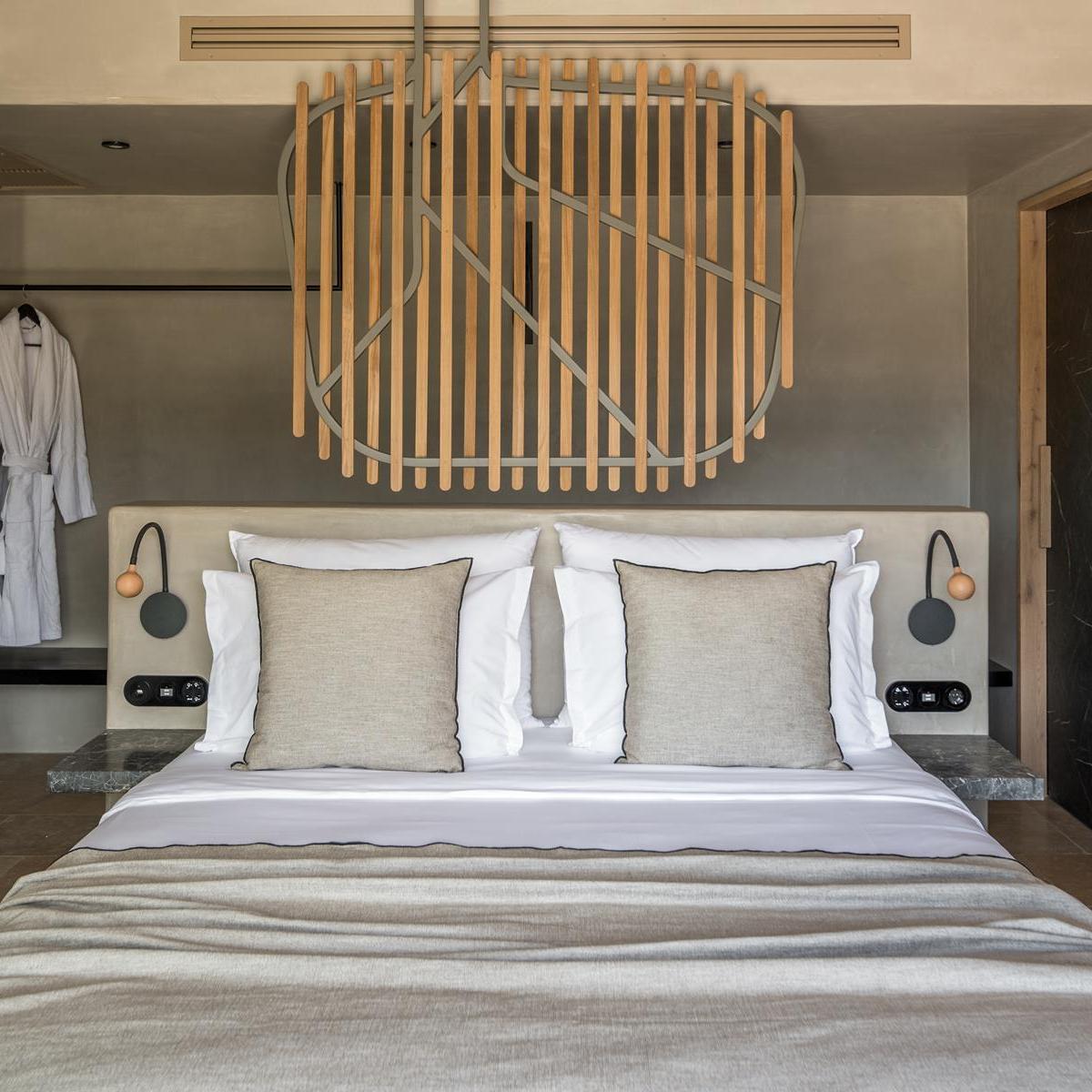 a bedroom with a large bed in a room