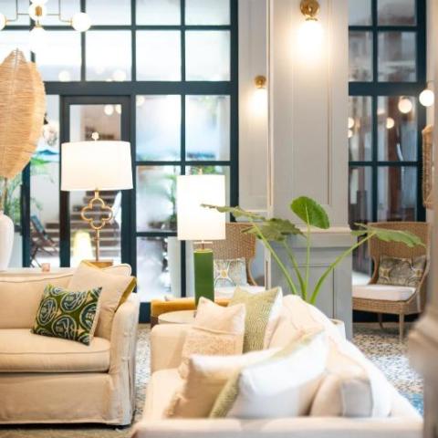 a living room filled with furniture and a fire place