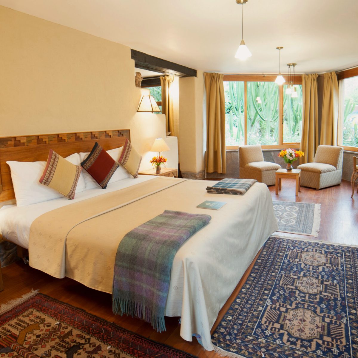 a bedroom with a large bed in a hotel room