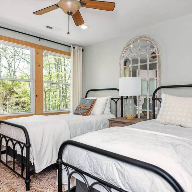 a bedroom with a large bed in a hotel room