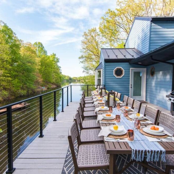a wooden bench sitting on top of a picnic table
