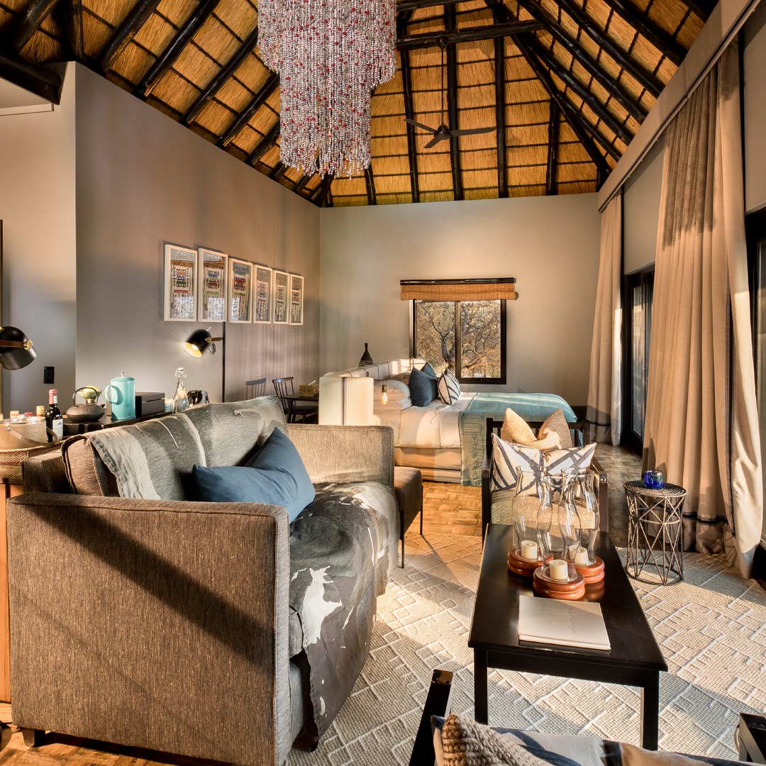 a living room filled with furniture and a fireplace