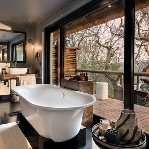 a room filled with furniture and a large window