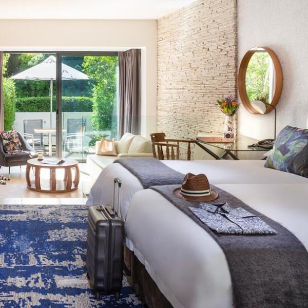 a living room filled with furniture and a large window