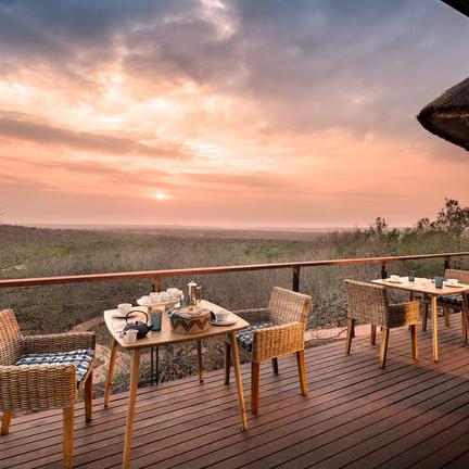 a wooden bench sitting on top of a table