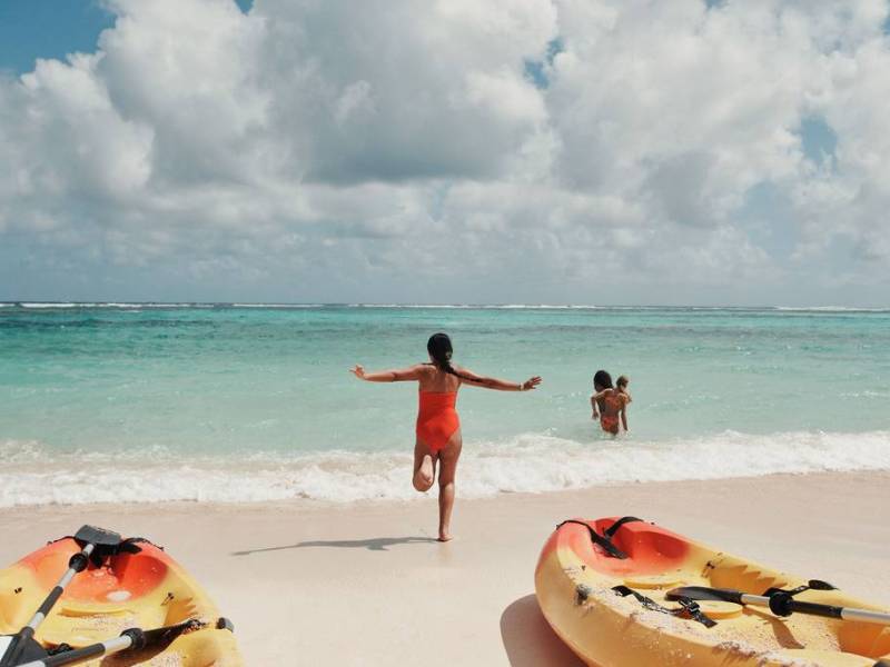 a group of people on a beach