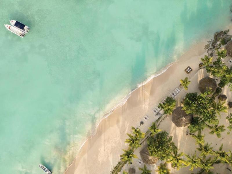 a person riding a wave on a surfboard in the water