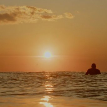 a sunset over a beach