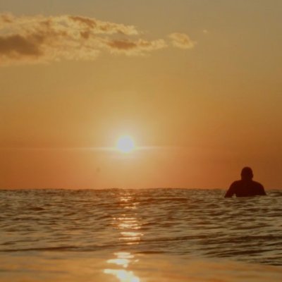 a sunset over a beach